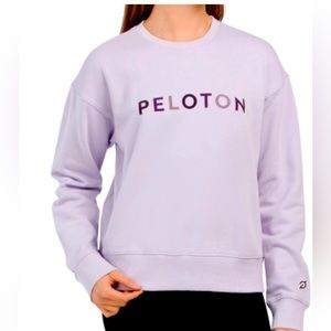 Peloton long sleeve purple, crew neck pullover.